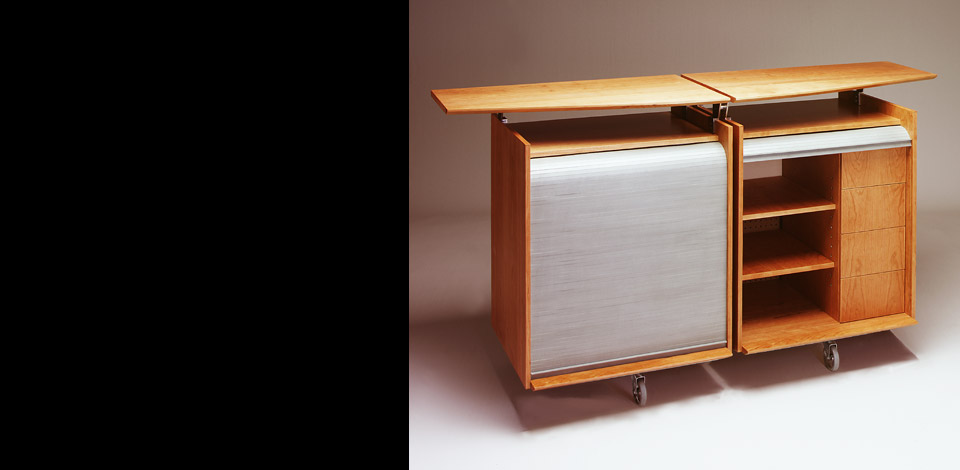 <p>Stereo Cabinet</p><p>1996</p><p>Designed as a multi-purpose Audio-Visual cabinet for a residence in West Vancouver. The top slides open allow for more surface area to place hot foods on the granite top.</p><p>Cherry veneer plywood, with cold rolled steel tube structure, and granite top.</p><p>Height 38'' Depth 23'' Length 66''</p>